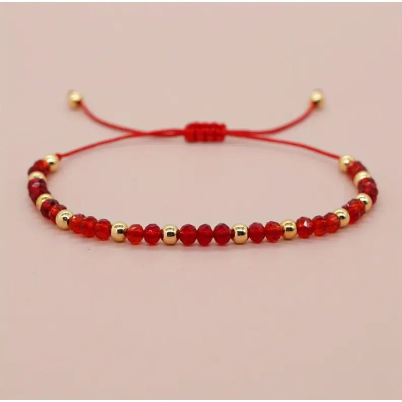 CORAZÓN DE ÁMBAR - Pulsera roja de cristal y baño de oro