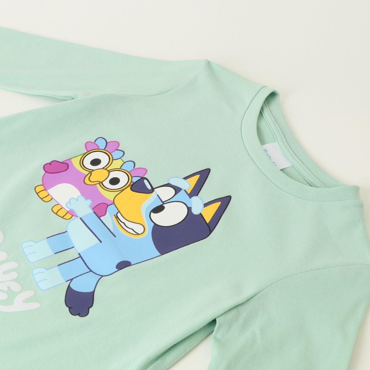BLUEY - Polera Manga Larga Niño Peluche Verde Bluey