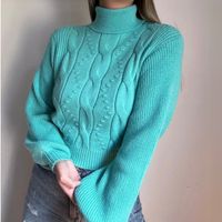 Sweater trenzado elasticado