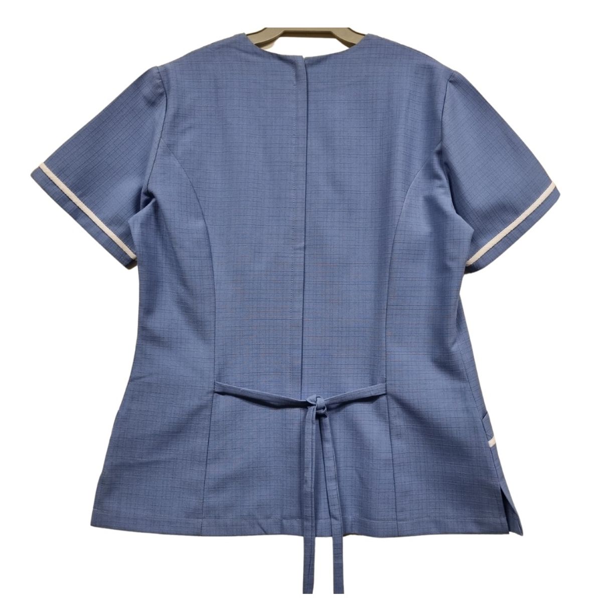 90 GRADOS - Chaquetilla Celeste Con Ribetes Blancos Modelo Cruzado Para Mujer