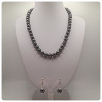 Collar + aros de perlas Swarovski  con broche de plata y circones.