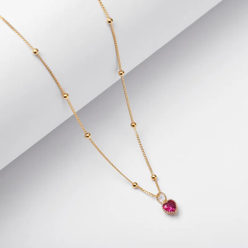 BY LAS CAYETANAS - Collar gold Corazón de cristal fucsia