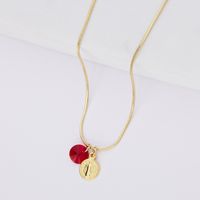 Collar con medalla San Benito bañados en Oro 18k y cristal