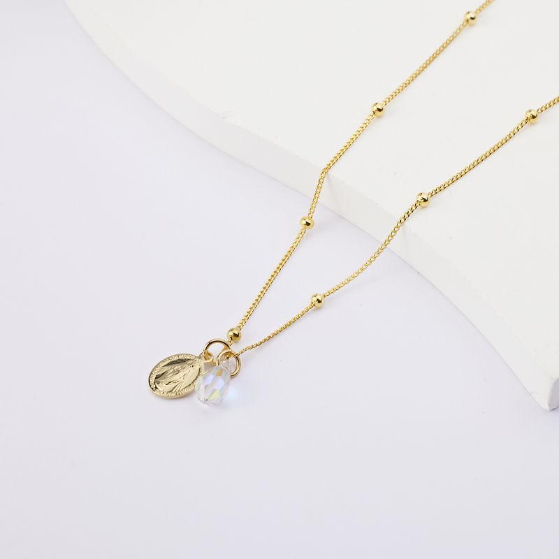 BY LAS CAYETANAS - Collar Virgen de los Rayos bañados en Oro 18k y cristal blanco