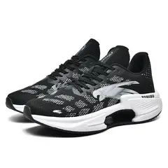 9KSAFETYJB - Zapatillas running transpirables absorción de impactos blanco y negro