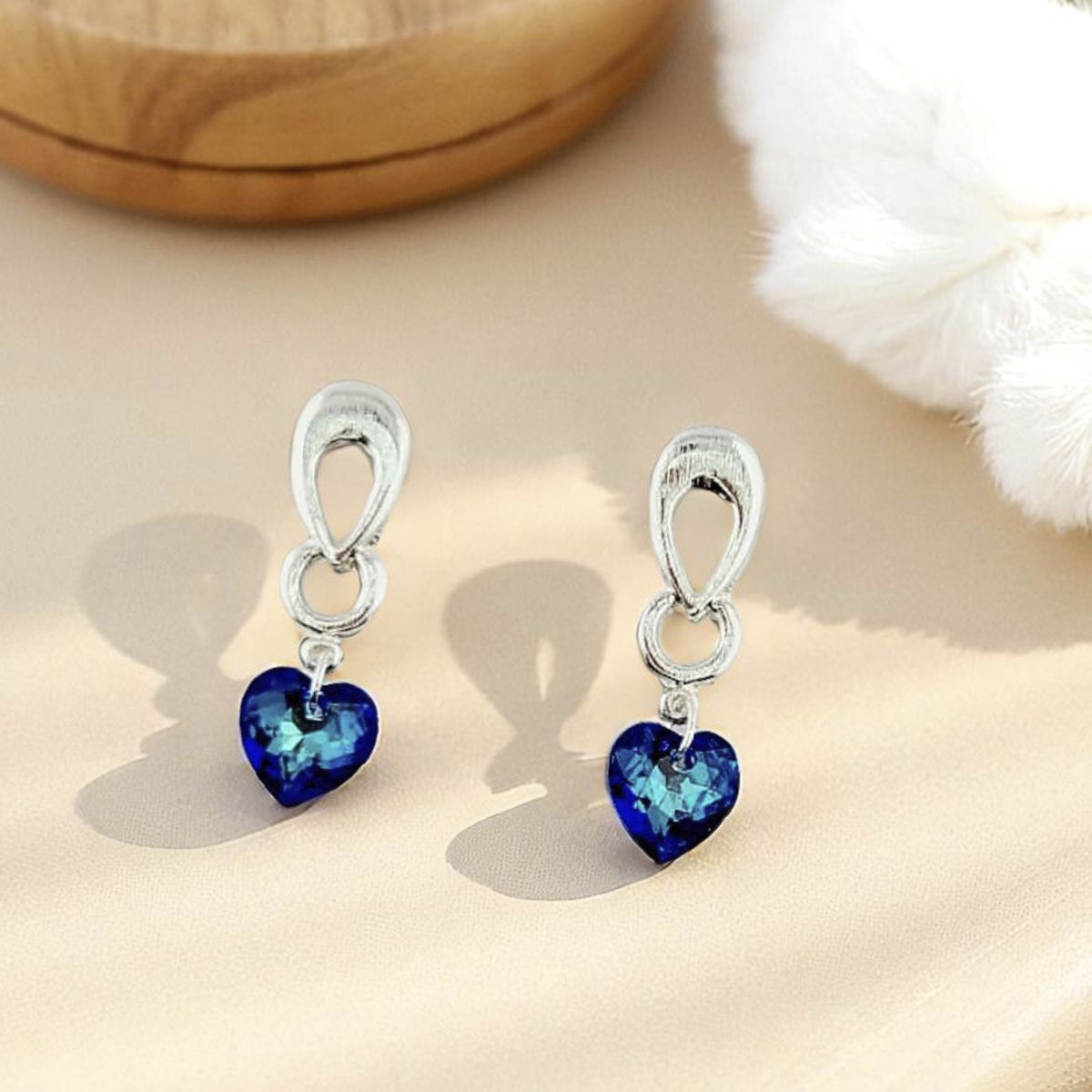 JOYAS MONTERO - Aros Amor Baño Oro Blanco creado con cristales de Swarovski® Bermuda Blue