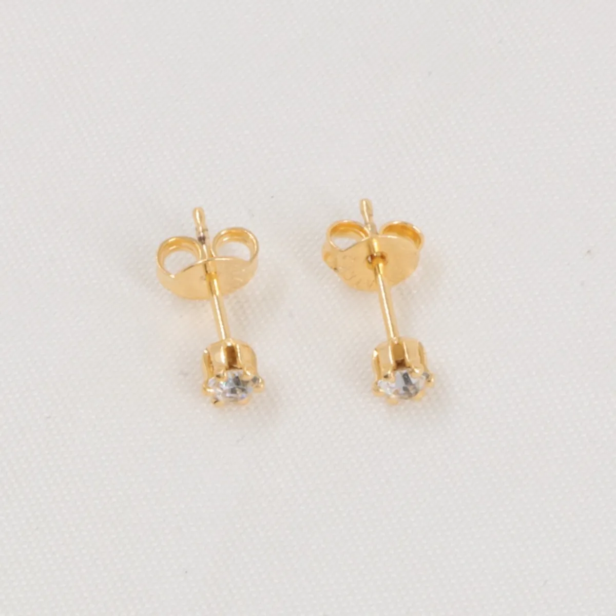 GENERICO - Arete topo chispa circonia oro laminado 18k
