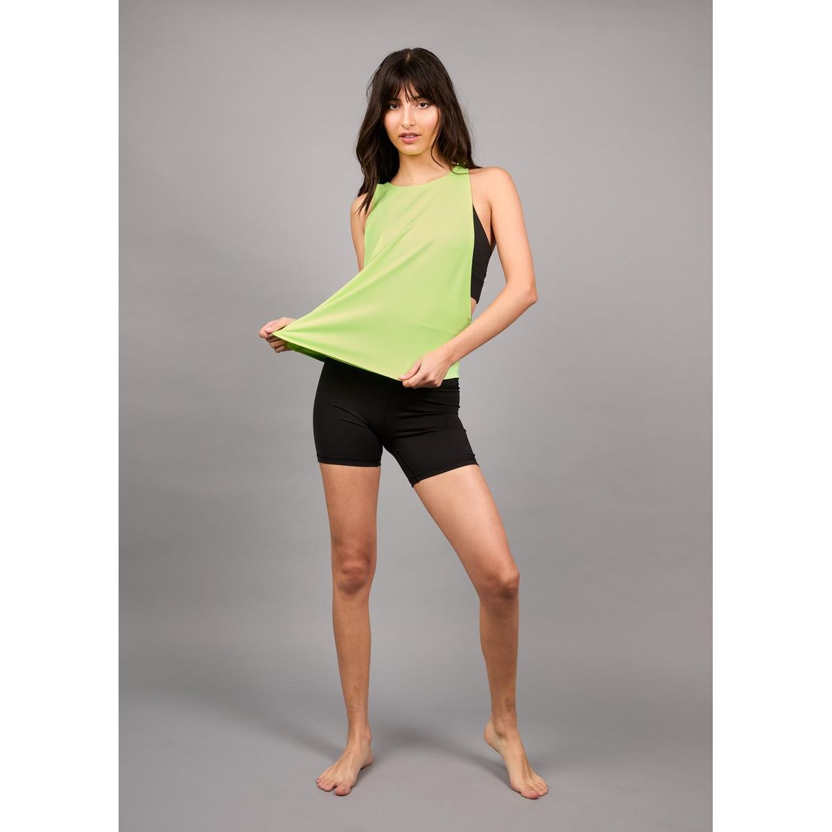 THEA - Polera Ligera Sin Mangas Apex Fluor Green