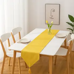 ARMONIA - Camino de mesa lino amarillo 180x33 cm con borlas decorativas
