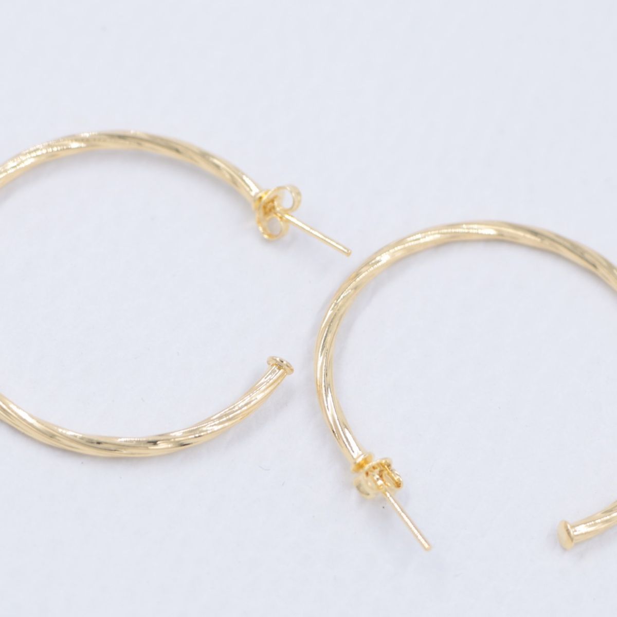 GENERICO - Arete candonga espiral mediana oro laminado 18k
