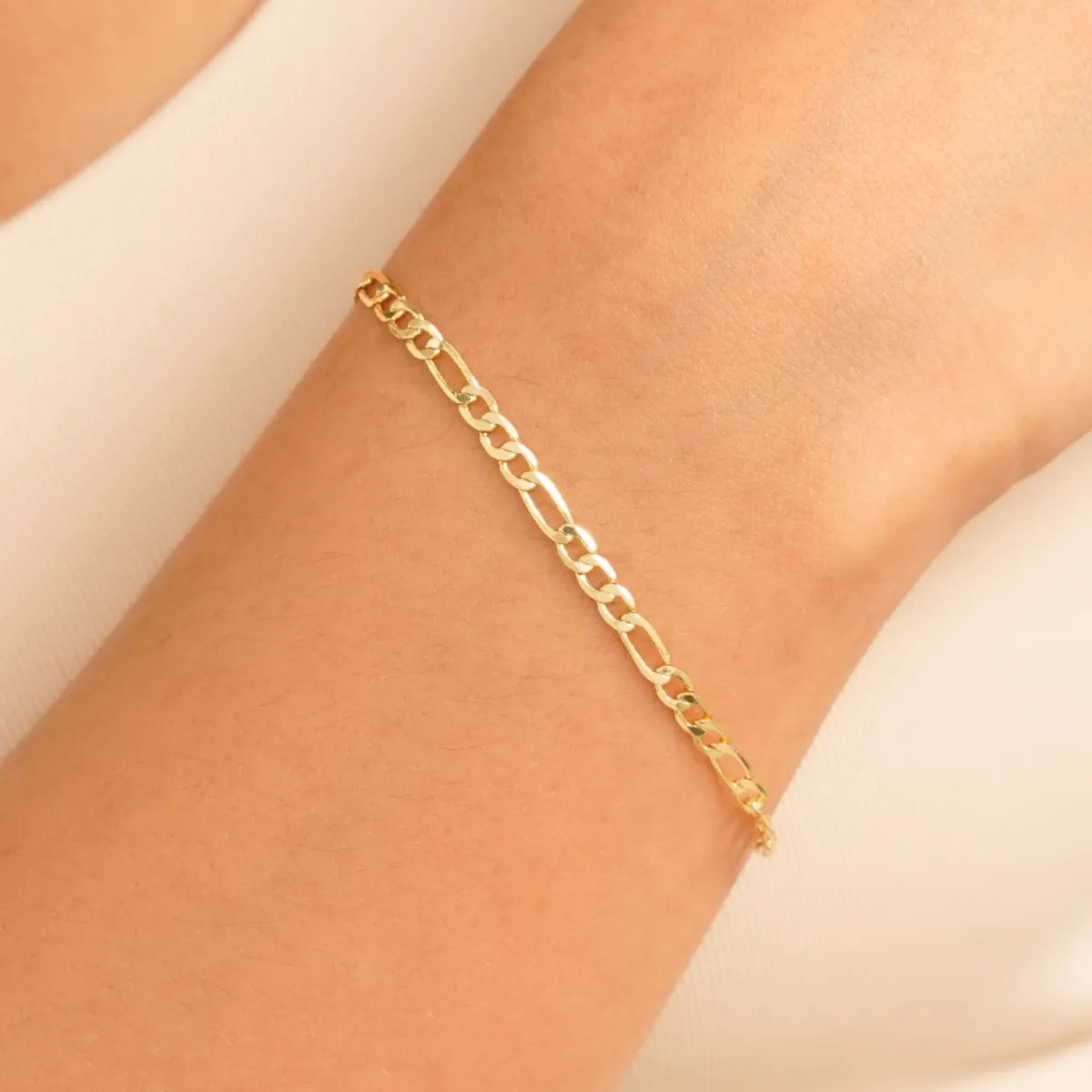 GENERICO - Pulsera tejido Crtier semi delgado oro laminado 18k