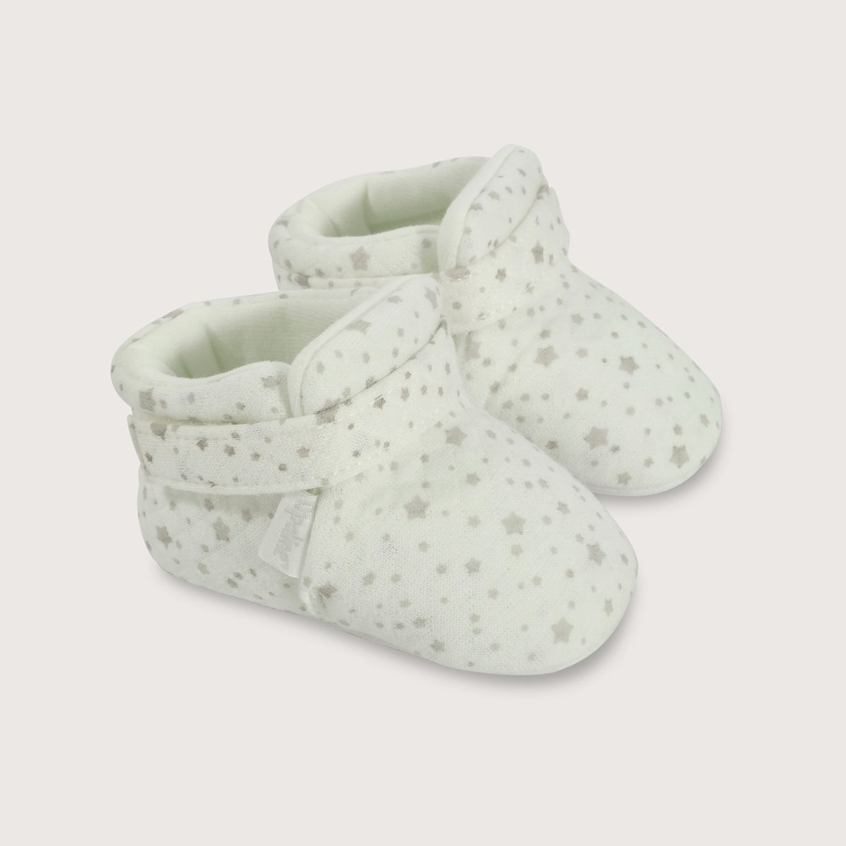 OPALINE - Pantufla abrigada para bebé: blanca con estrellas