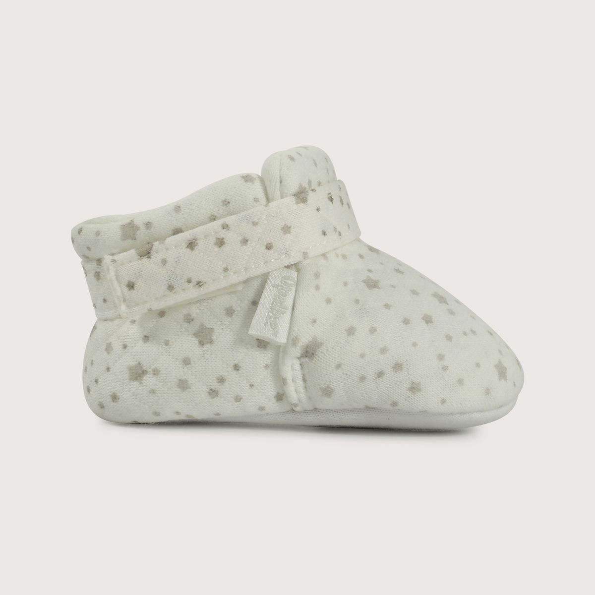 OPALINE - Pantufla abrigada para bebé: blanca con estrellas