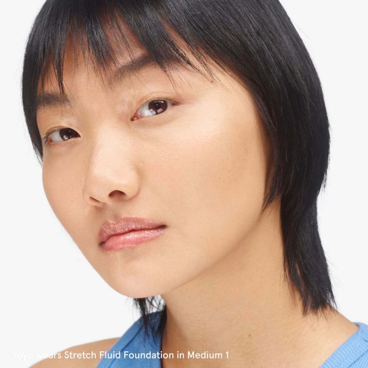 GLOSSIER - Base de Cobertura Media Stretch Fluid - Medium 1 Glossier