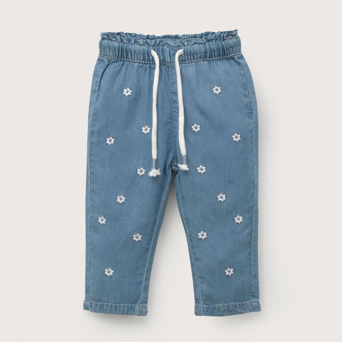 OPALINE - Jeans jogger con bordado azul de niña