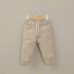 OPALINE - Pantalón jogger beige de niño