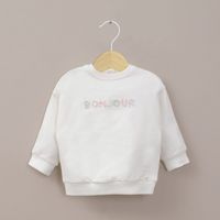 Polerón blanco de bebé niña