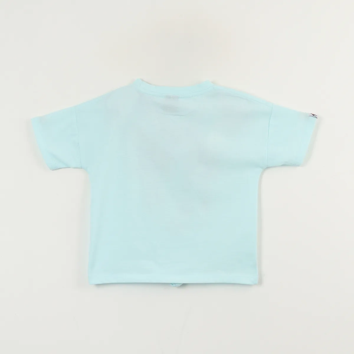 DISNEY - Polera Manga Corta Niña Celeste Minnie Guiño Disney