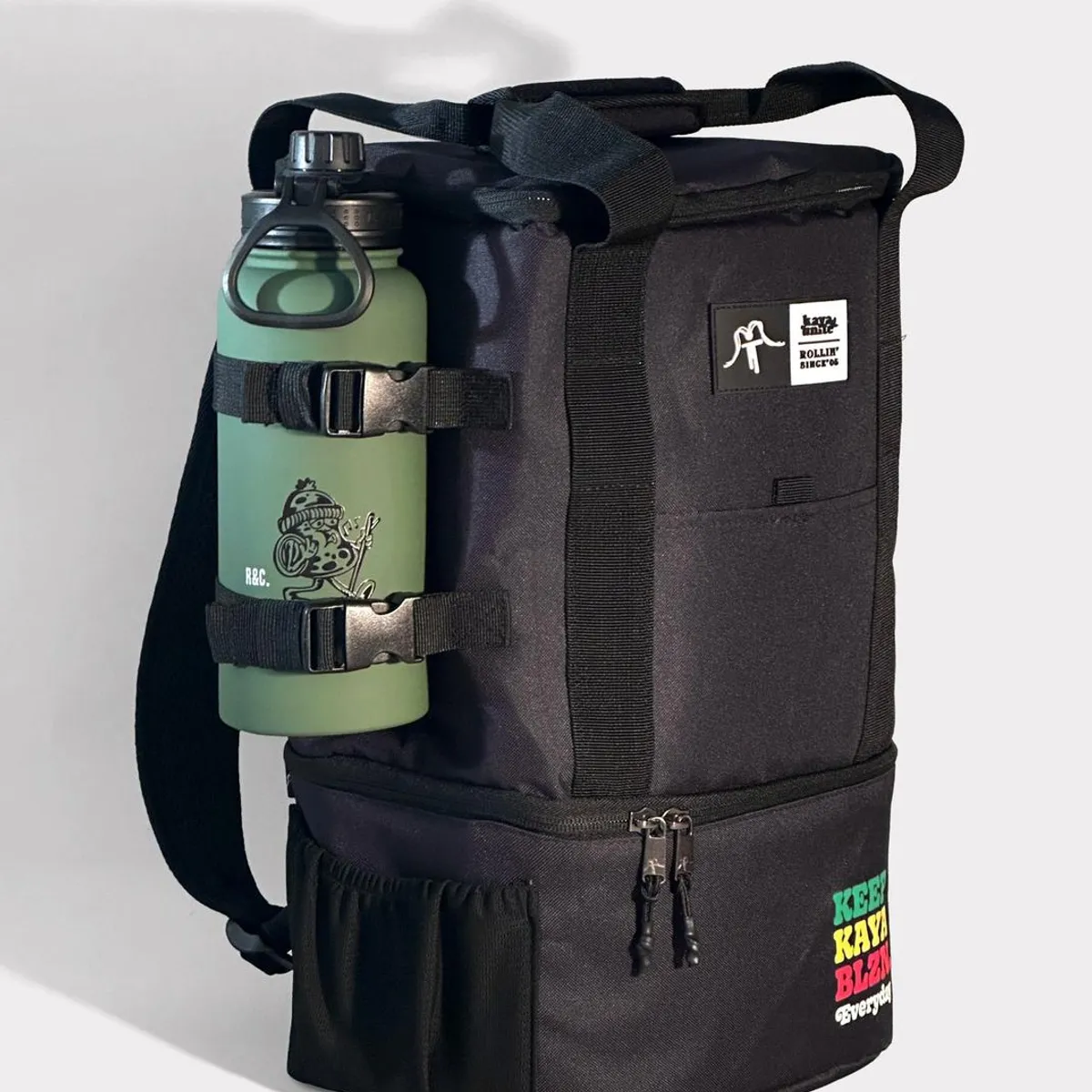 KAYA UNITE - Mochila Cooler Nomade Rasta Negro