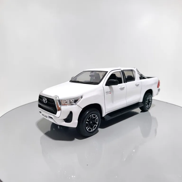 Toyota Hilux Blanca Escala 127 - Miniatura Coleccion