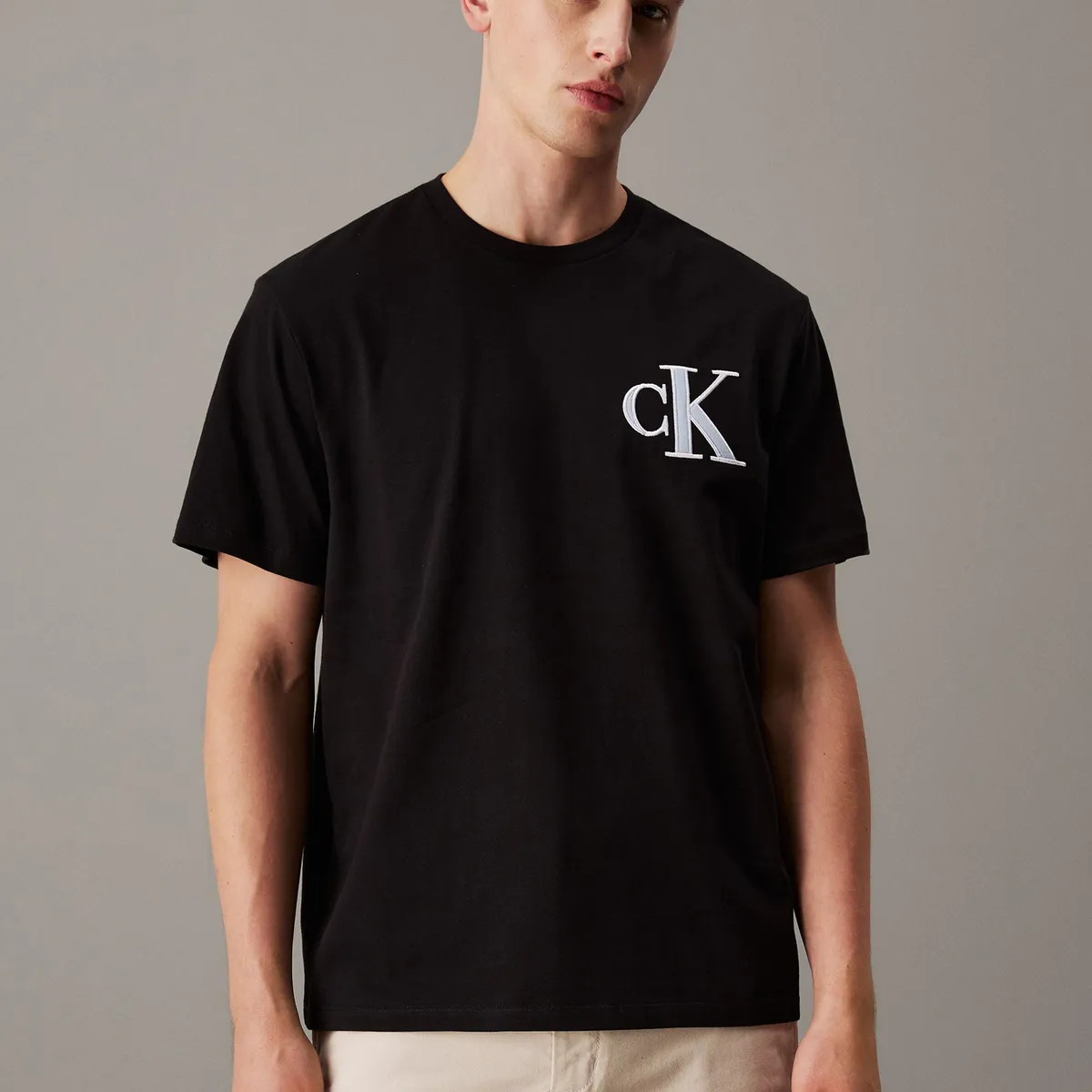 CALVIN KLEIN - Polera 20S Varsity Negro Calvin Klein