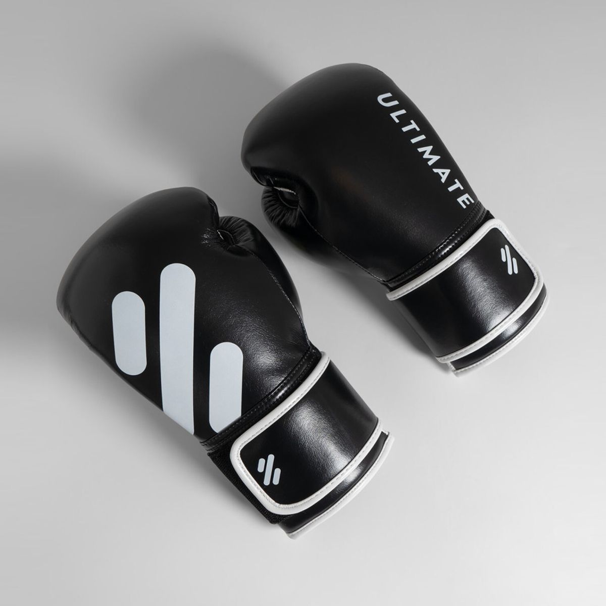 ULTIMATE FITNESS - GUANTE BOXEO ALI - BLACK AND WHITE 12 OZ