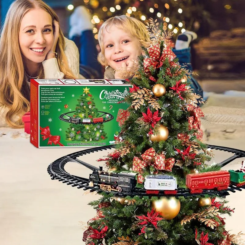 GENERICO - Pista de trenes luces sonido alrededor del arbol