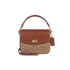COACH - Bolso de hombro cruzado para mujer de PVC con detalles de cuero