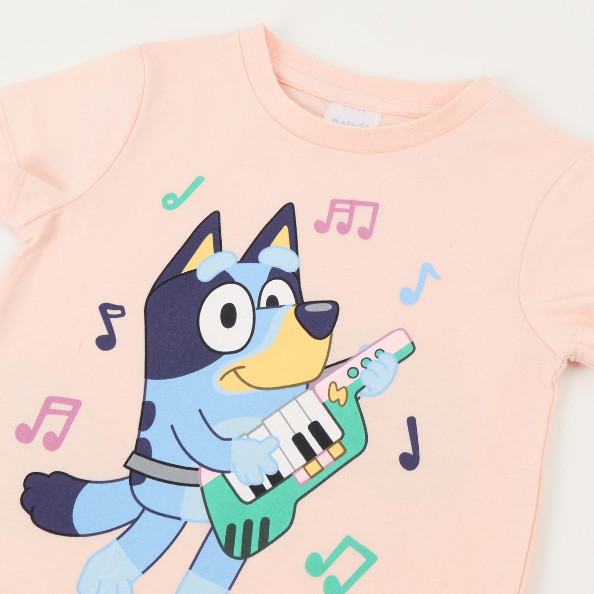 BLUEY - Polera Manga Corta Niña Naranjo Musica Bluey