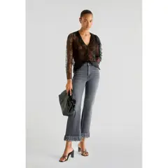 SCALPERS - JEANS BAJO DESFLECADO