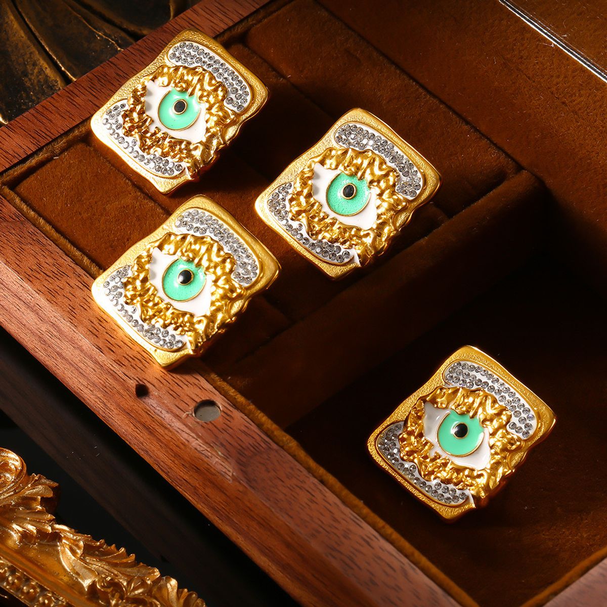 LUX JOYAS - Aros Baño Oro Amarillo 18k Cuad Ojos Brillitos