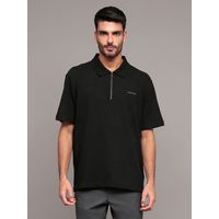 Polo relaxed con tejido crepe Negro