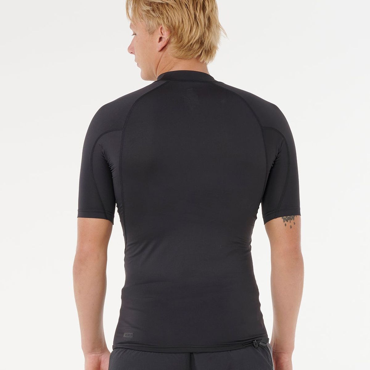 RIP CURL - Polera UVP Oceanwake Negro Hombre Rip Curl