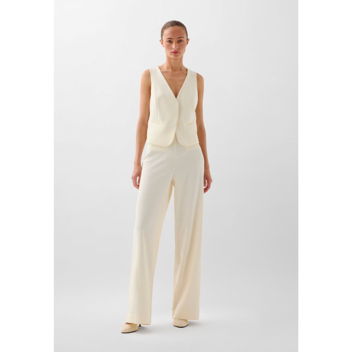 SCALPERS - CHALECO LAZO TRASERO