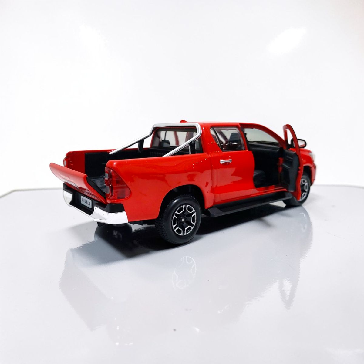 MAISTO - Toyota Hilux SRX Roja Escala 1-27 - Maisto  Colección