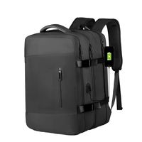 Mochila de Viaje Impermeable 32L con Puerto USB y Compartimento para Notebook 16”