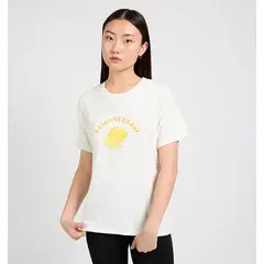 ELLESSE - POLERA MUJER AVANI NARANJO/AMARILLO