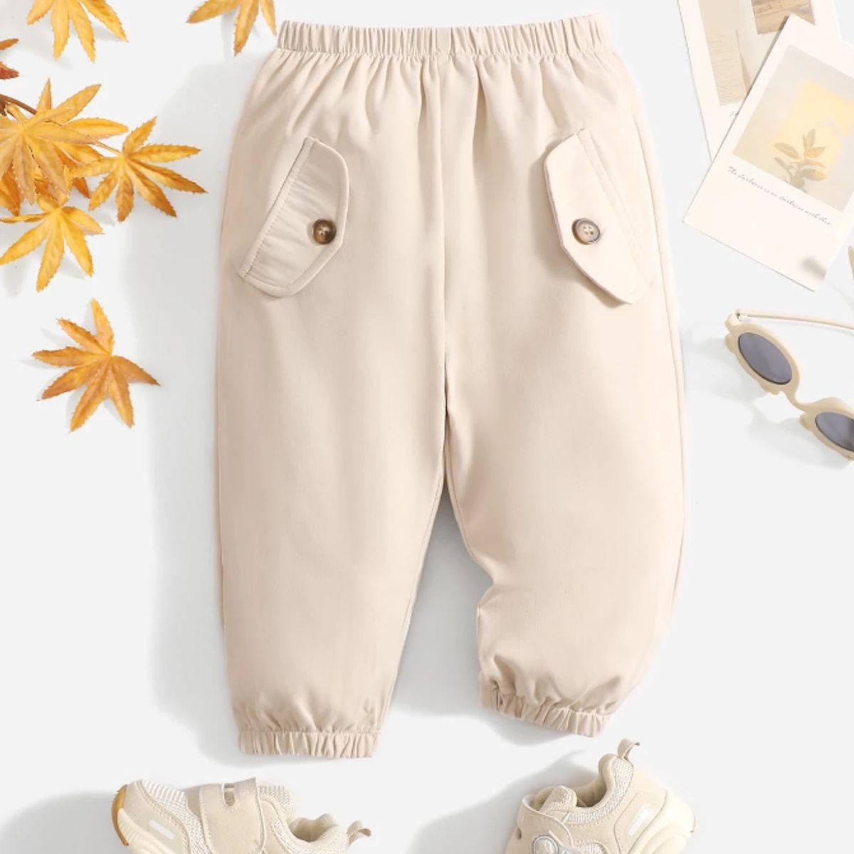 KIRAMA CLOTHING STORE - Pantalón largo beige con bolsillos y botones para chicos y chicas