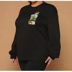KIRAMA CLOTHING STORE - Polera negra con bolsillo estampado y manga larga caída