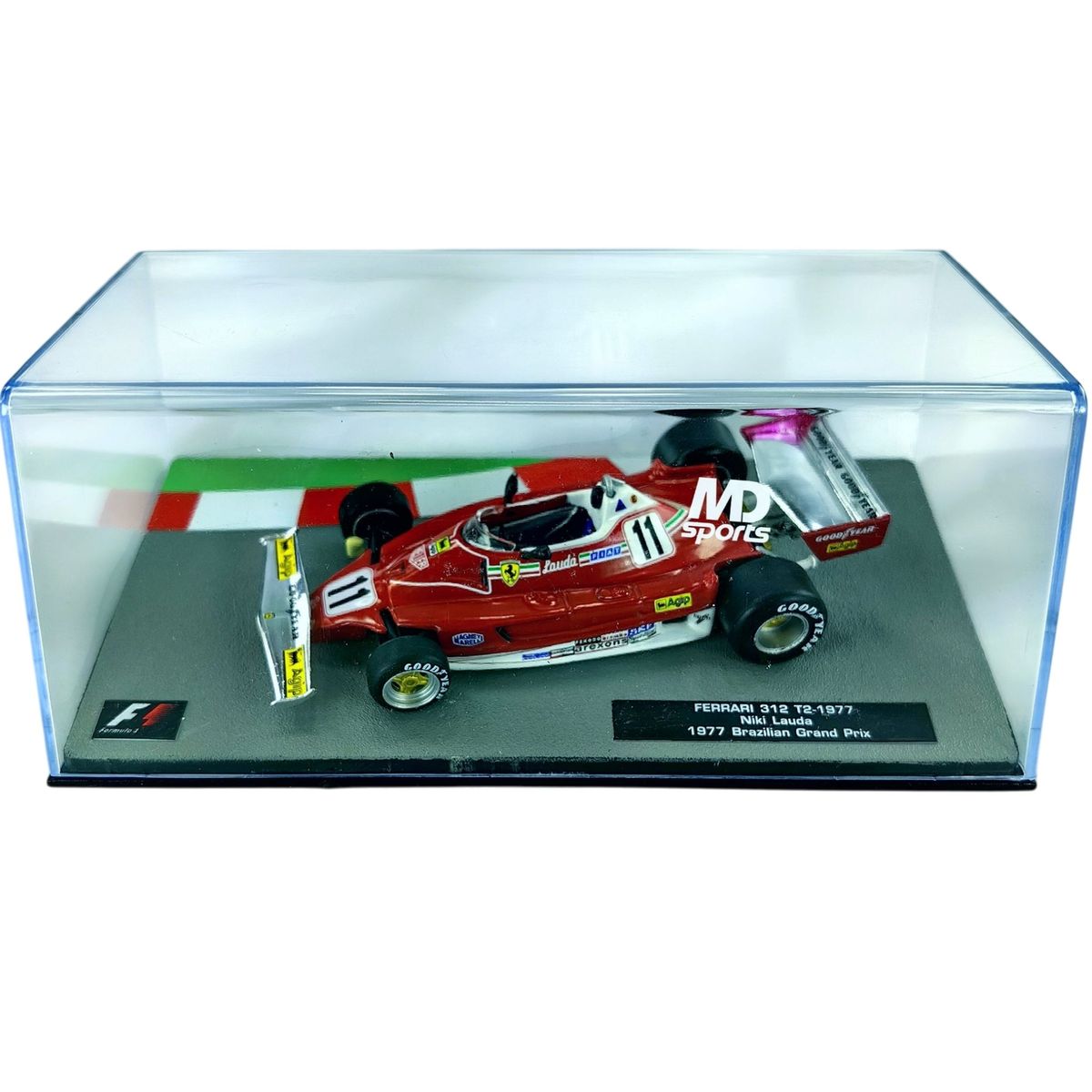 FORMULA 1 - Pack Formula 1 Ferrari 312 T2 1977 Caja Acrilica + Figura Niki Lauda 1:43