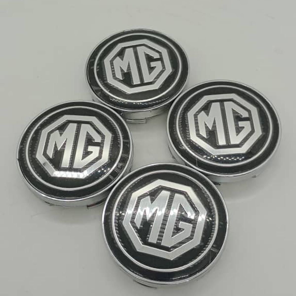 GENERICO - X4 Tapas centro de llantas de auto tunning MG NEGRO CON PLATA 56MM