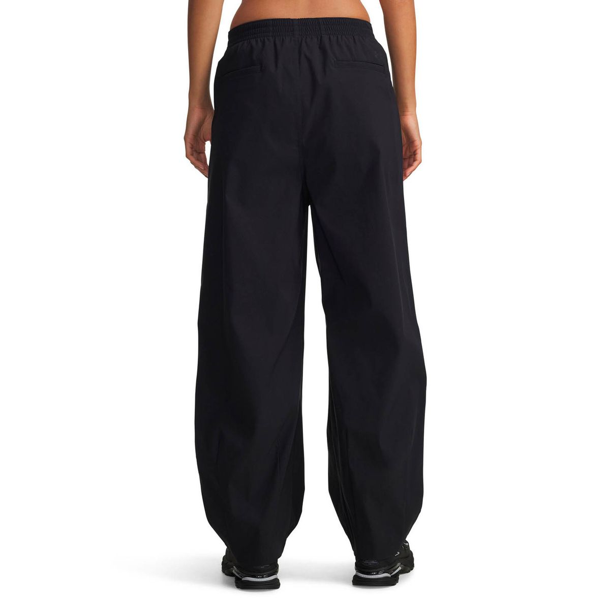 UNDER ARMOUR - Pantalones Lifestyle mujer Unstoppable Woven negro UNDER ARMOUR