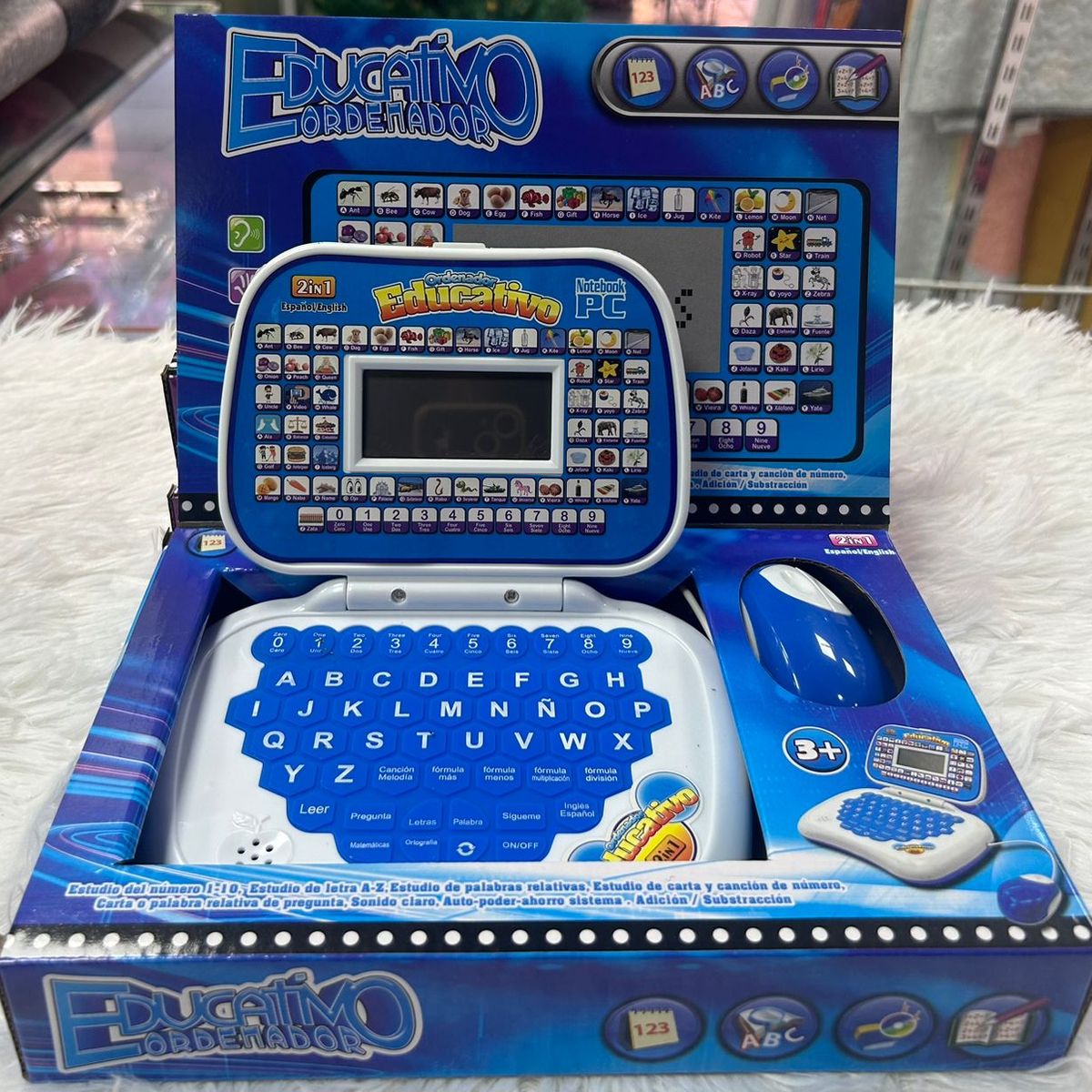 GENERICO - COMPUTADORA EDUCATIVA BILINGUE CON PANTALLA PARA NIÑO COLOR AZUL CON DISEÑO DINOSAURIO NES WYM