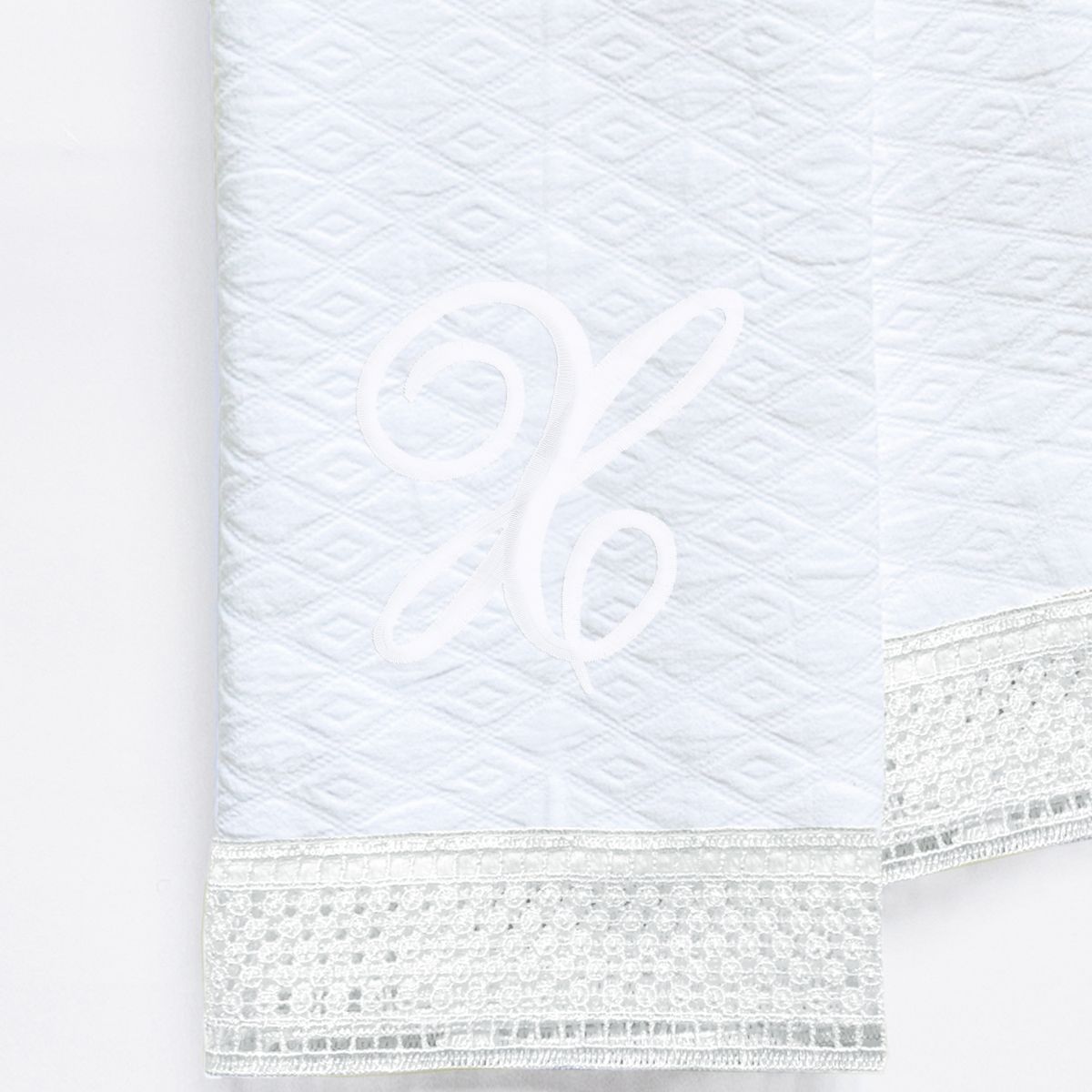 NINA HERRERA - Toalla de Visita Piqué Rombos Letra X Blanco