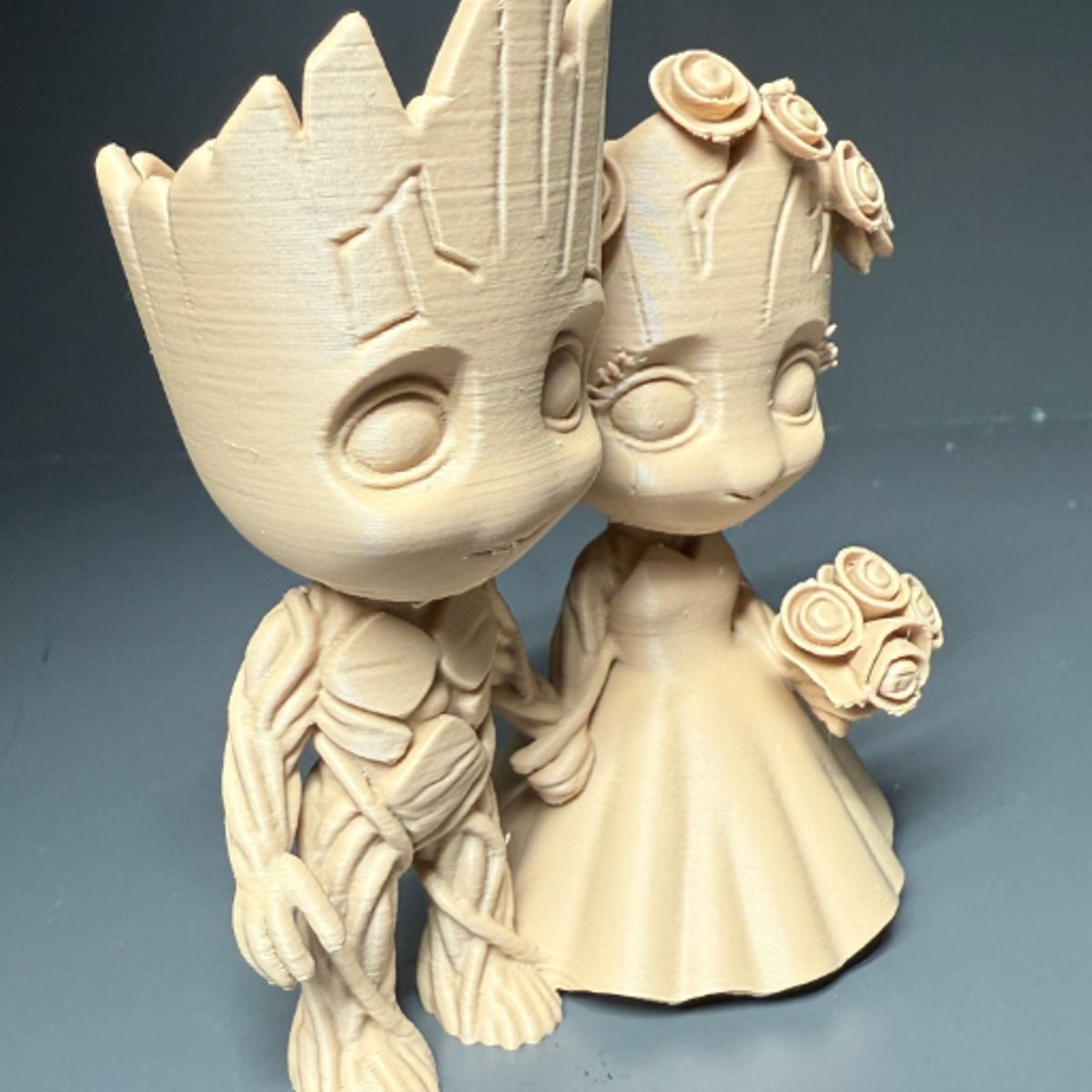 GENERICO - Figura Decorativa- Pareja de Groot