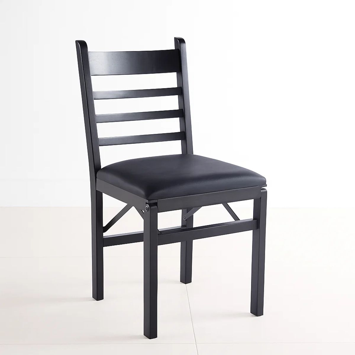 KLIK - Silla Industrial Plegable con Marco Negro y Tapizado Sintético