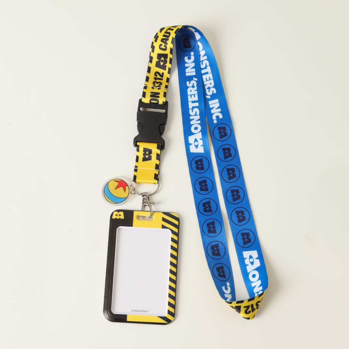 DISNEY - Colgante Niño Amarillo Warning Pixar Disney