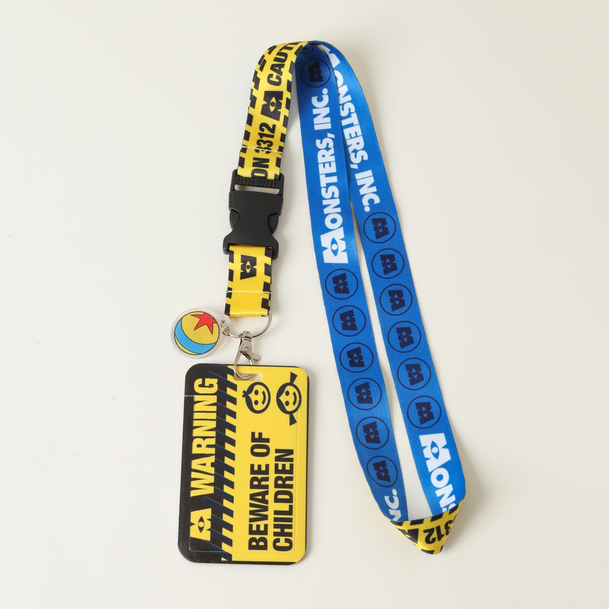 DISNEY - Colgante Niño Amarillo Warning Pixar Disney