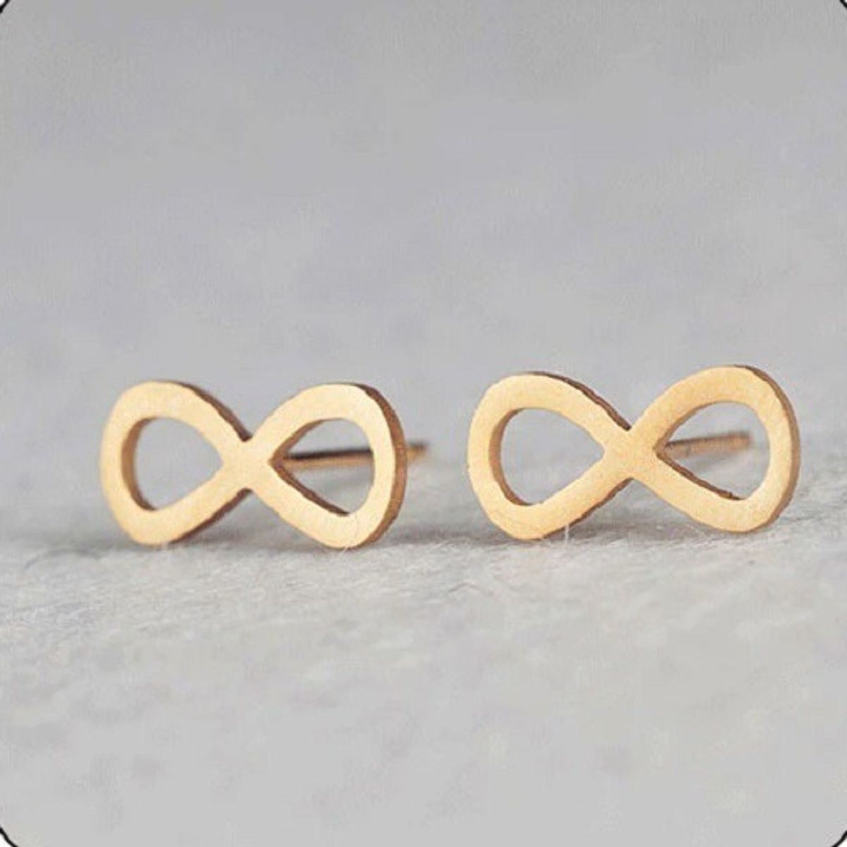 GENERICO - Aros Infinito Gold Space Mujer Mnimalista Acero Quirurgico