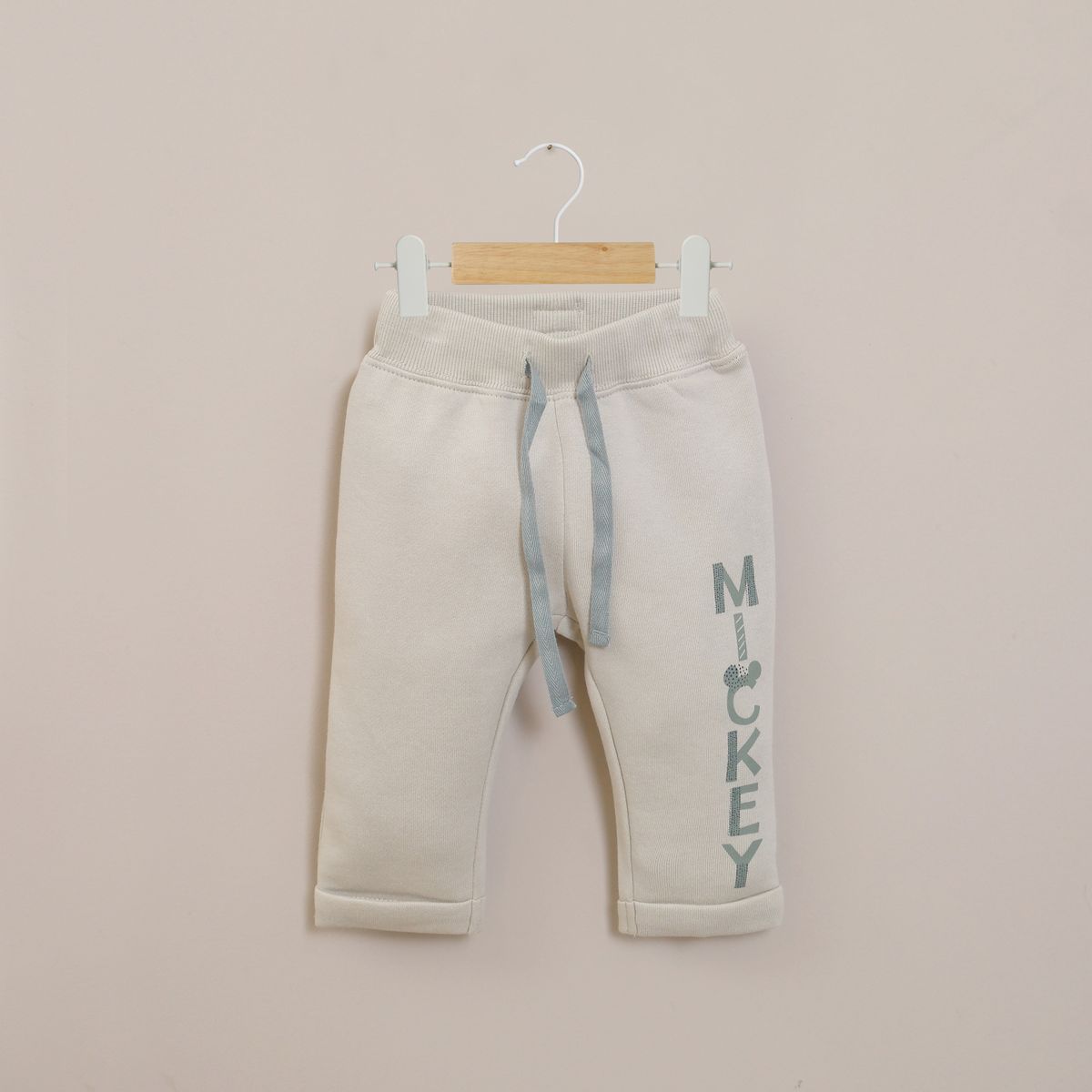 OPALINE - Pantalon Buzo Infant Niño Beige Disney